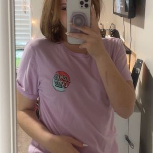 Purple Santa Cruz T-shirt with two of their classic designs put into one shirt.